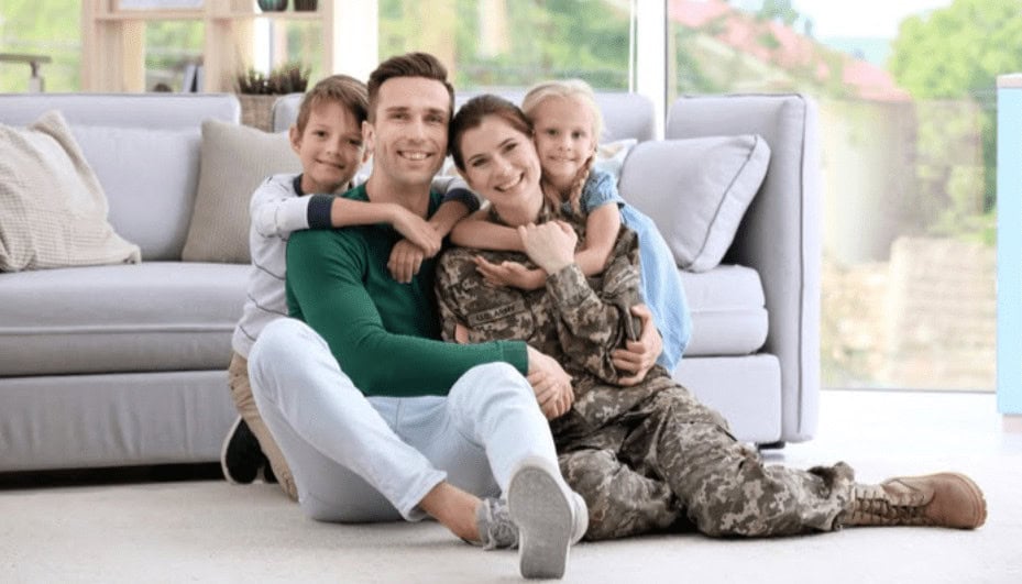 Family enjoying time together on couch, homeschooling or digital learning, happy family, modern living room, promoting IT and tech skills training at MyComputerCareer.