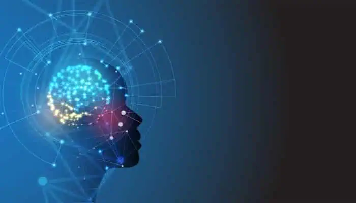 AI-powered digital brain silhouette with interconnected data points and glowing neural network graphics representing tech education and computer career training.