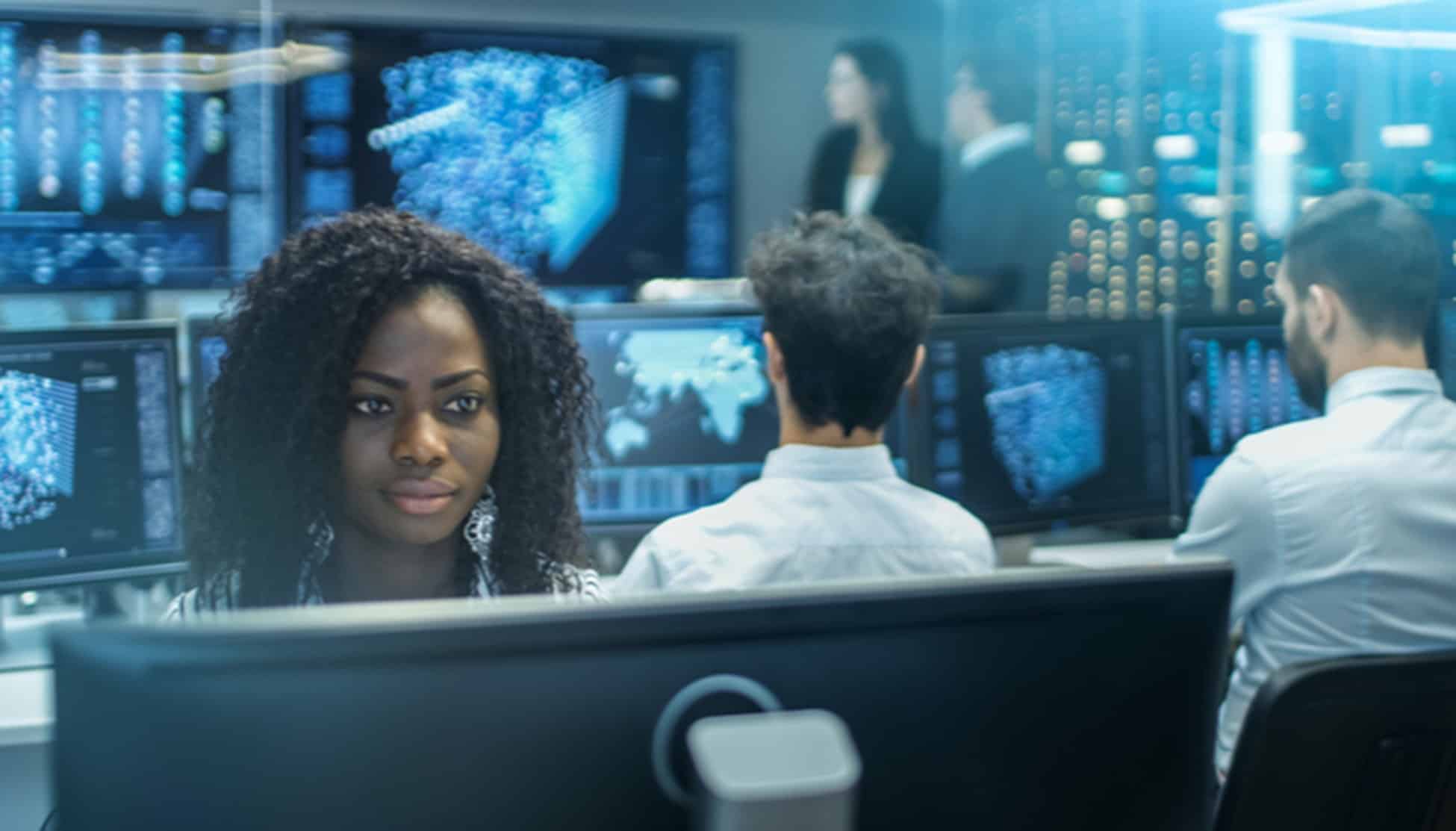 Innovative classroom with students working on computer technology and cybersecurity training at MyComputerCareer, preparing for IT careers.