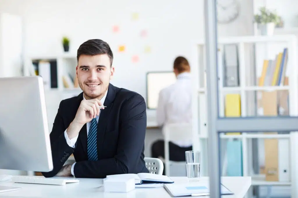 businessman-by-computer-