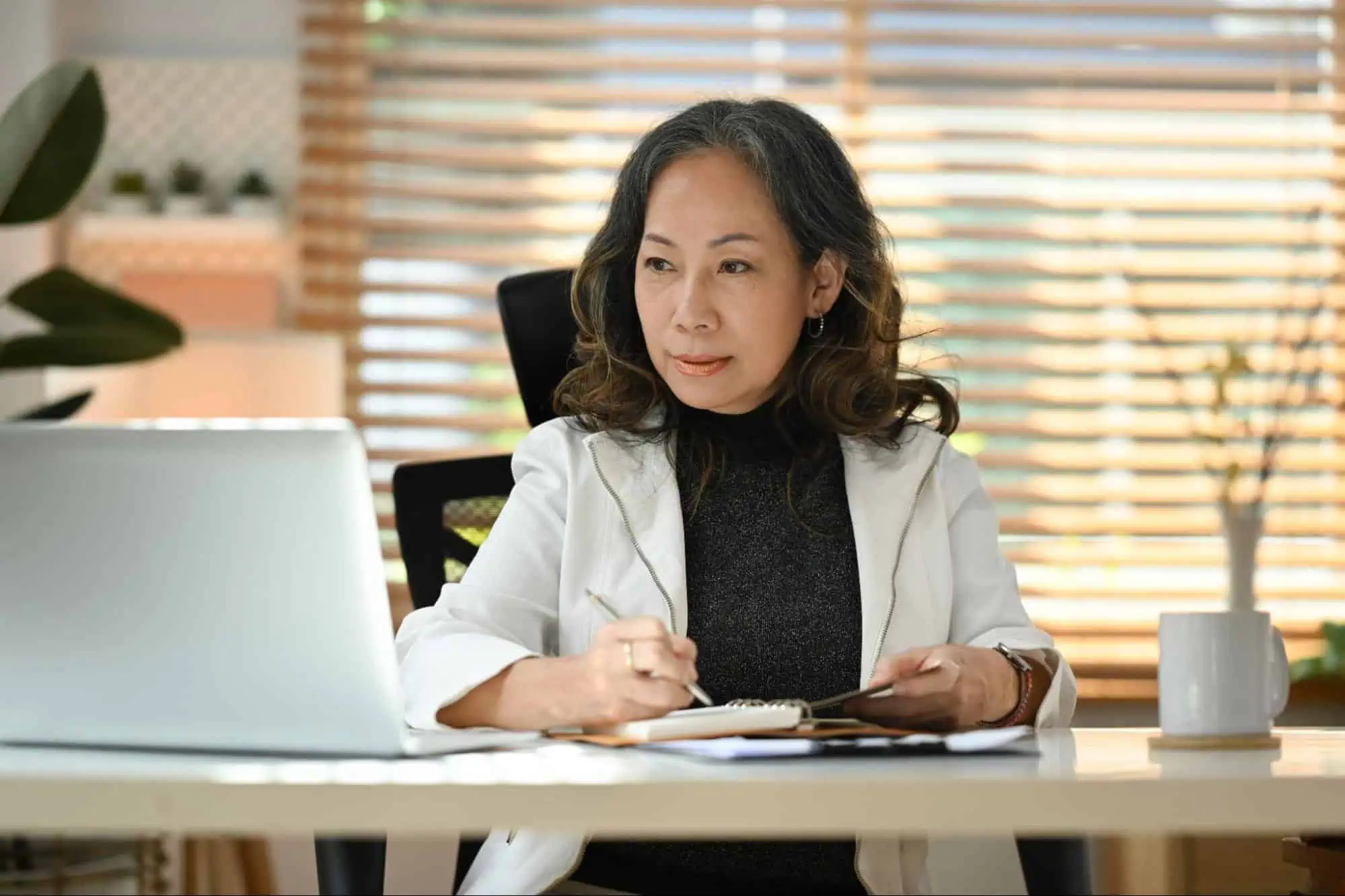 Focused woman studying computer skills during online IT training at MyComputerCareer.