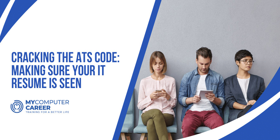 Three professionals at a desk reviewing an IT resume on a laptop, discussing how to optimize it for an Applicant Tracking System.