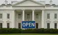 White House with open sign displayed outside