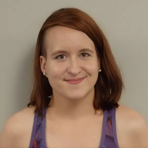 Smiling woman with short brown hair